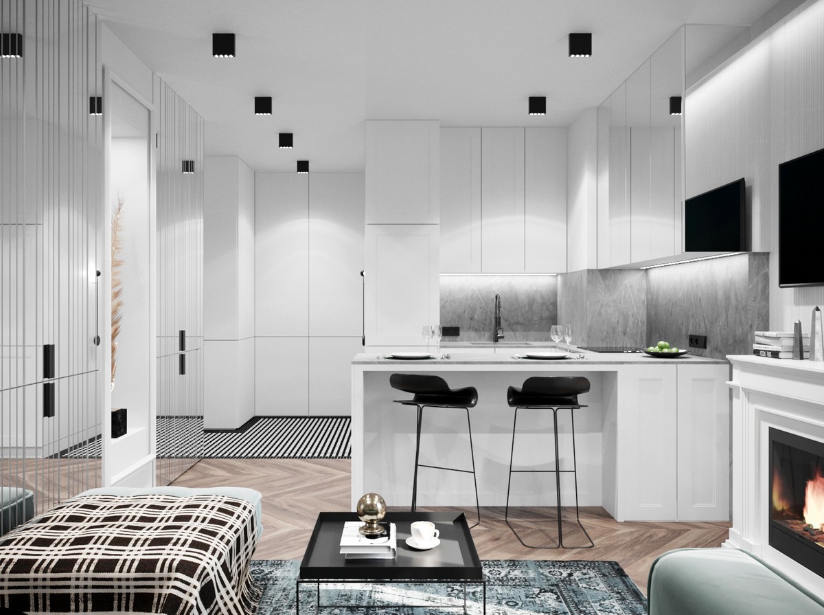 Zdjęcie przedstawia wnętrze nowoczesnego mieszkania, fronty meblowe z piaskowanych luster, kamienny blat kuchenny nowoczesne oświetlenia. Projekt mieszkania od Make It Yours - biura projektowania wnętrz z Krakowa