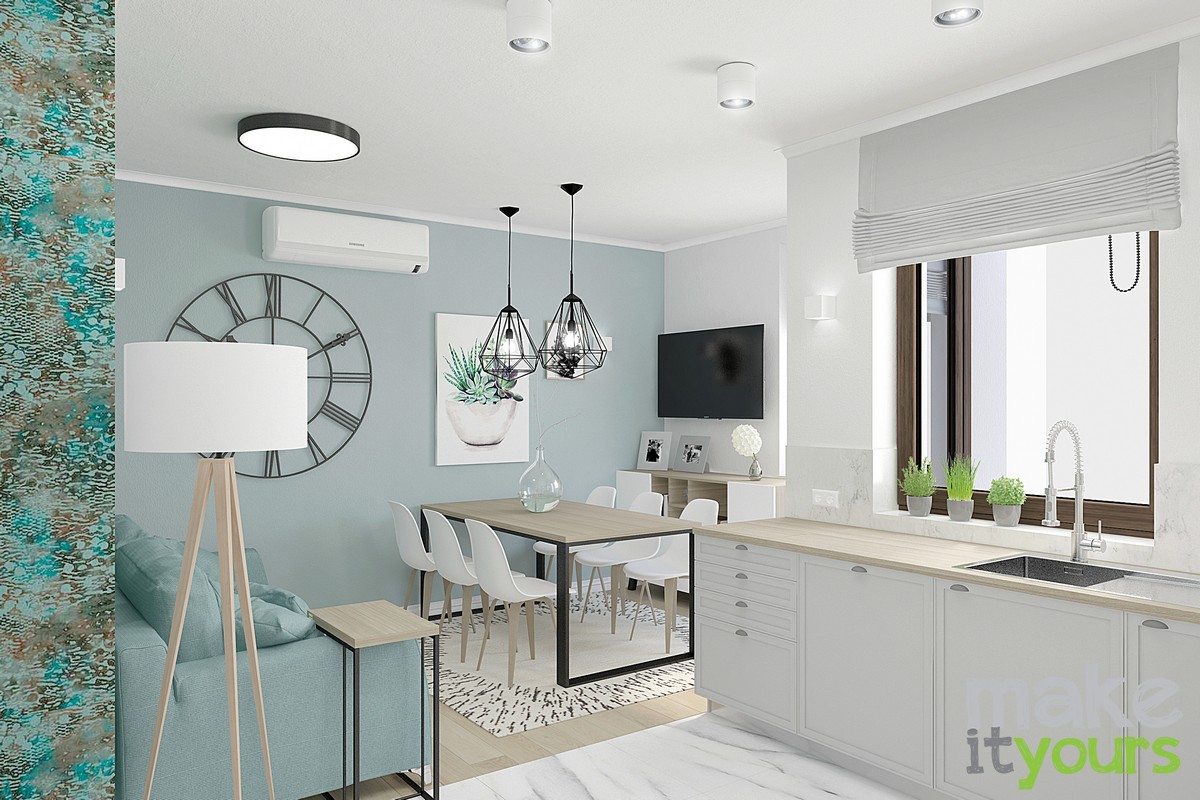 Zdjęcie przedstawia jasne wnętrze salonu z kuchnią w kolorach bieli i pastelowych odcieniach mięty, według projektu wnętrz mieszkania wykonanego przez Make It Yours - biuro projektowania wnętrz z Krakowa.