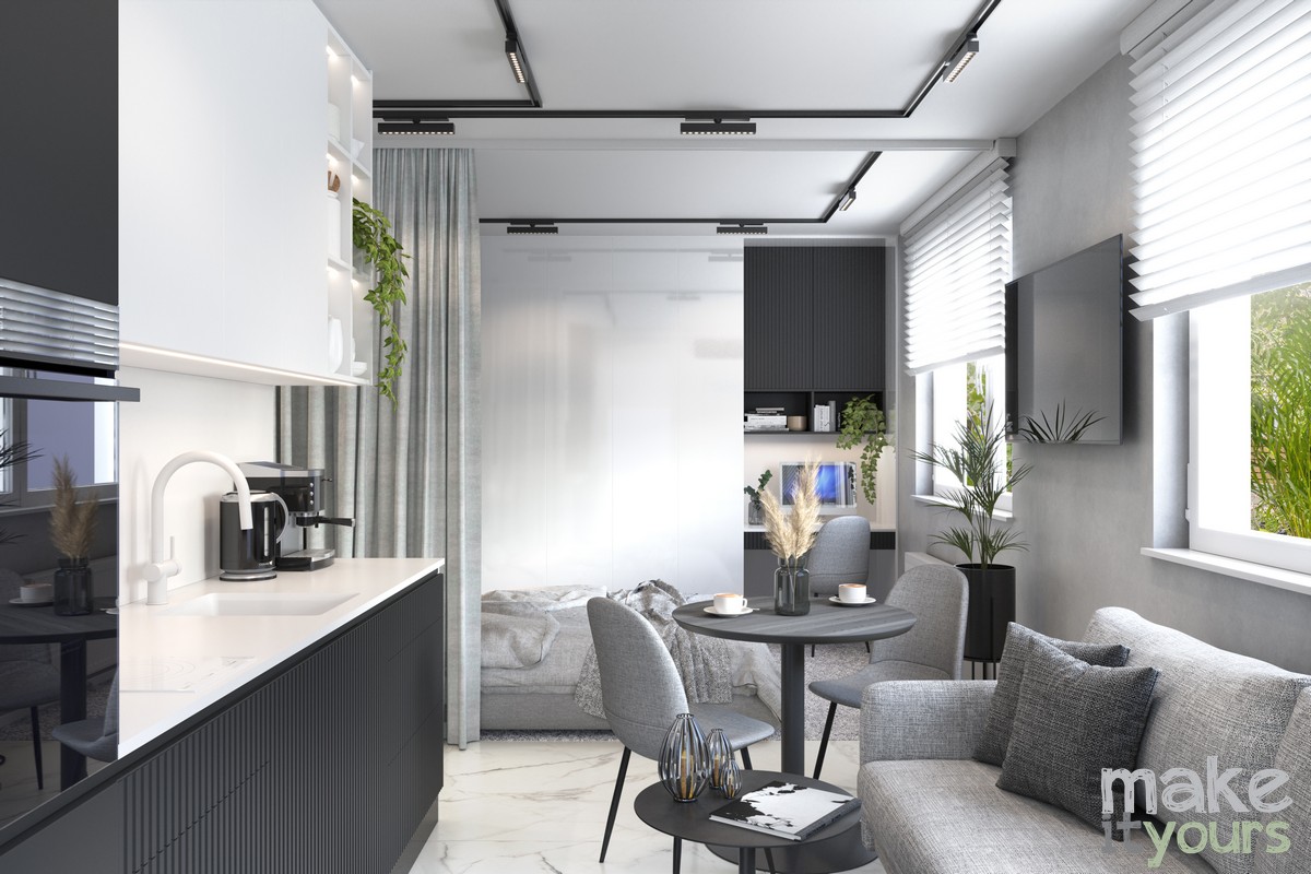 Zdjęcie przedstawia widok na salon z kuchnia i sypialnię w tle. To Projekt mieszkania 30m2 od Pracowni Make It Yours z Krakowa